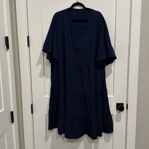 Navy size 22-24 women’s midi dress. Very flattering for all body types. Pockets!